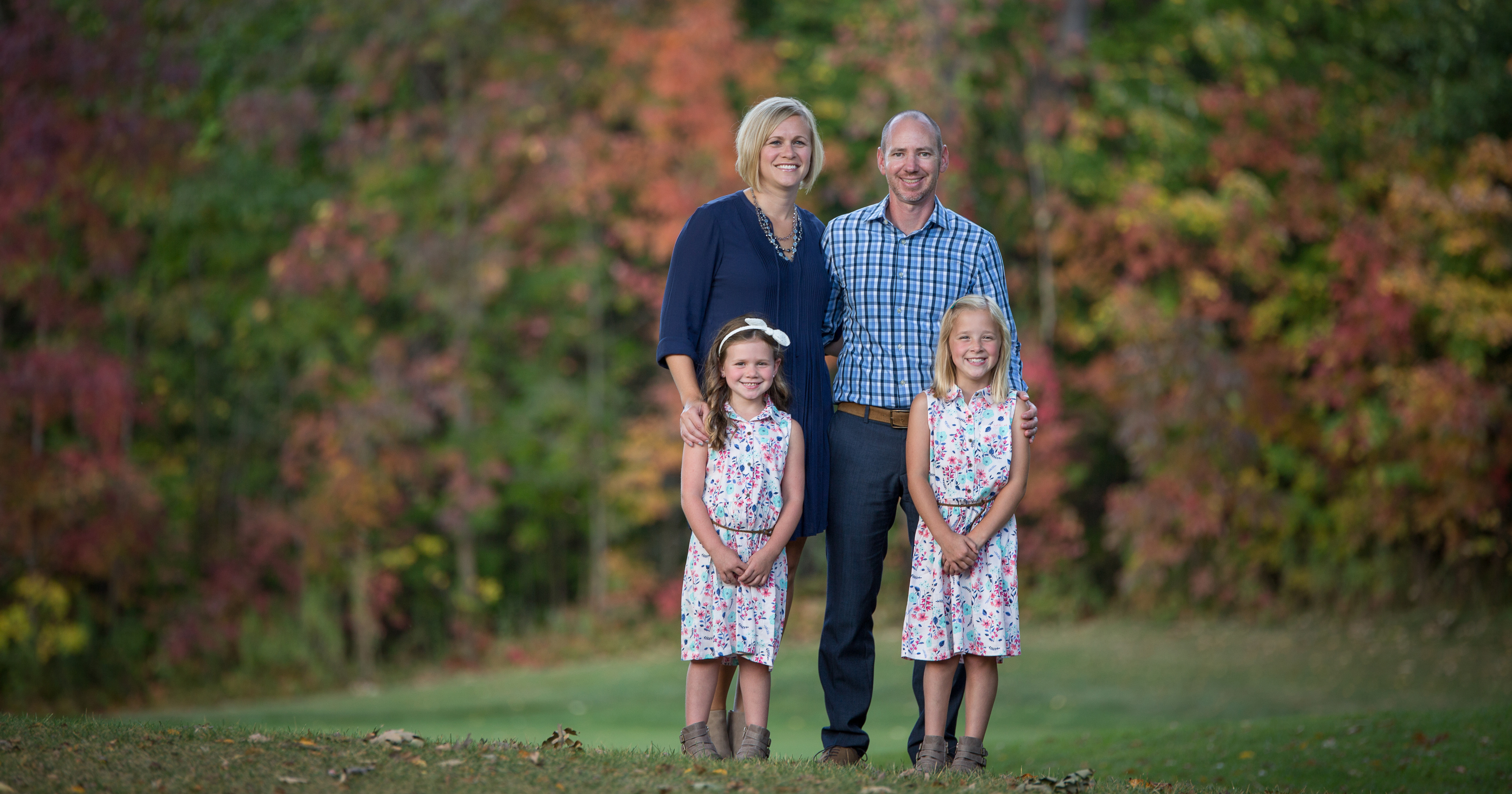 Katie '05 and John Rohrhoff with daughters Morgan, left, and Payton.