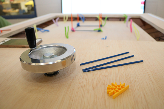 Simple tools, including children's toy building material, were used to create the earthquake table on display at the Michigan Science Center.