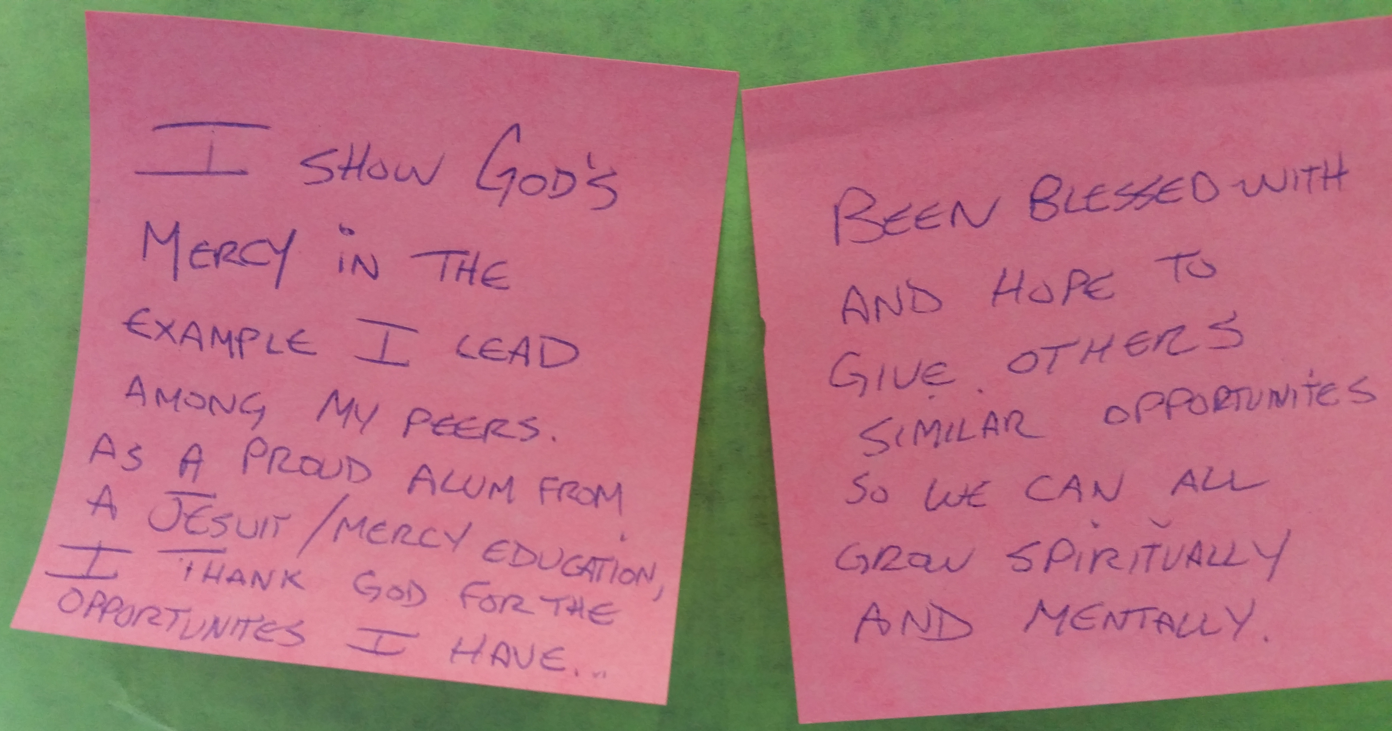 Students, alumni, faculty and staff posted ways they give and receive Mercy on boards around the McNichols Campus.