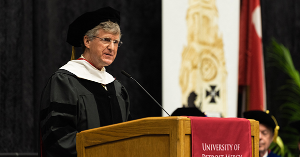 Rip Rapson of the Kresge Foundation addresses the crowd at the undergraduate commencement.