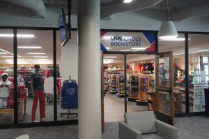 An exterior shot of the McNichols Campus Bookstore with items inside.