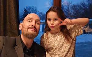 Steven Meerschaert poses for a photo with his daughter.