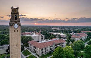 An aerial photograph of the McNichols Campus and its clocktower.