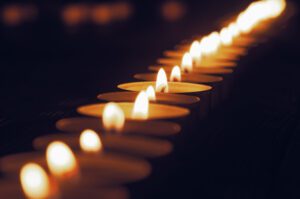 Row of lit tea lights