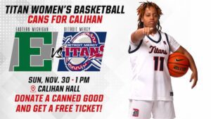 A flyer for Titan Women’s Basketball event titled “Cans for Calihan.” Large text at the top reads: “Titan Women’s Basketball – Cans for Calihan.” Below, two team logos are shown: Eastern Michigan’s green block “E” on the left and Detroit Mercy Titans logo on the right, with “vs” between them. Event details: “Sun, Nov. 30 – 1 PM at Calihan Hall.” Bold red text at the bottom says: “Donate a canned good and get a free ticket!” On the right side, a basketball player in a Titans uniform holds a basketball and points toward the viewer. Background is white with gray accents.