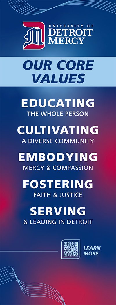 a banner featuring UDM's new core values: educating the whole person, cultivating a diverse community, embodying mercy and compassion, fostering faith and justice, serving and leading in detroit.