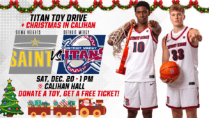 A flyer for the Detroit Mercy Men's basketball game on Dec. 20 at 1 p.m. in Calihan Hall, which is featuring a Toy Drive. The logos of Siena Heights and Detroit Mercy are in the center of the page with vs in between them. Two Detroit Mercy basketball player are on the right-hand side of the page. Text at the bottom of the pages says "donate a toy, get a free ticket."