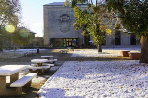 McNichols Campus Library in winter with snow on ground