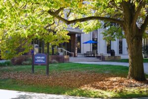 Image of outside of McNichols Campus Library in fall season