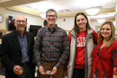Detroit Mercy faculty attend the reception
